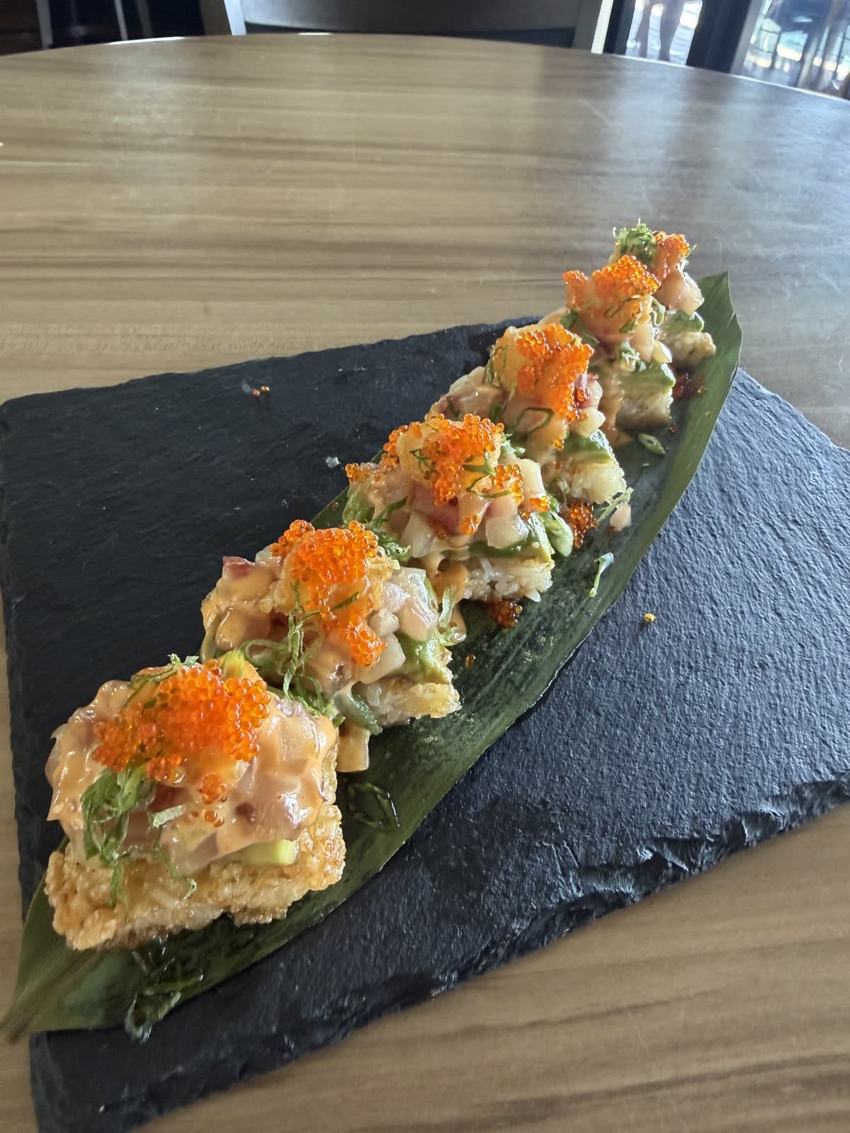 Crispy rice topped with hamachi and tobiko at Costa Fuego